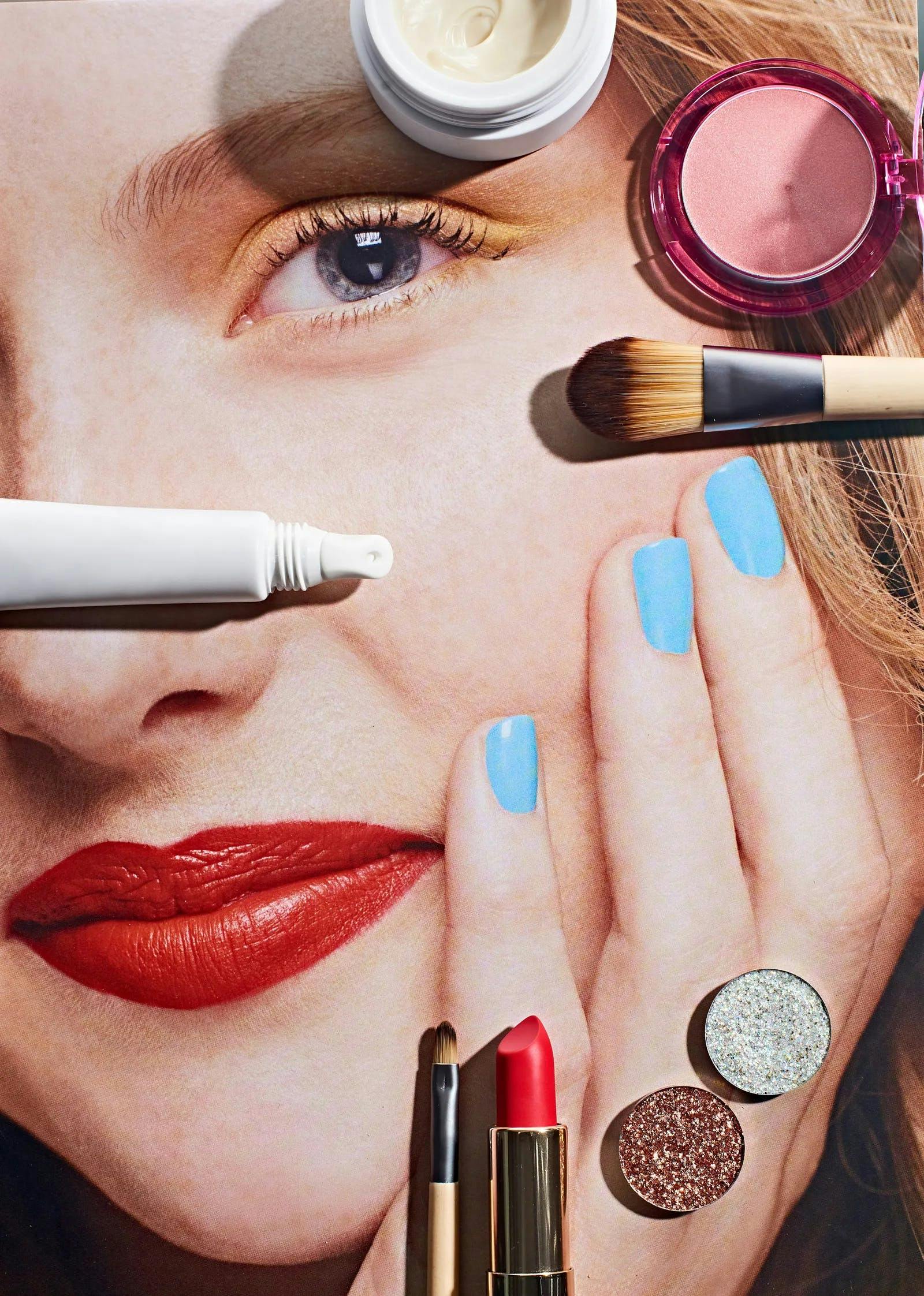 cosmetics lipstick brush device tool face head person medication pill