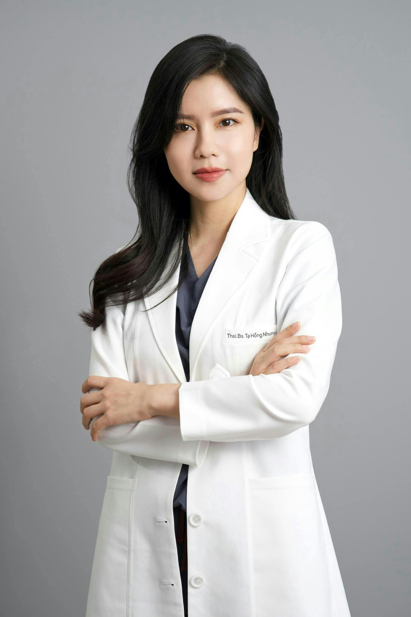 clothing coat lab coat adult female person woman face head