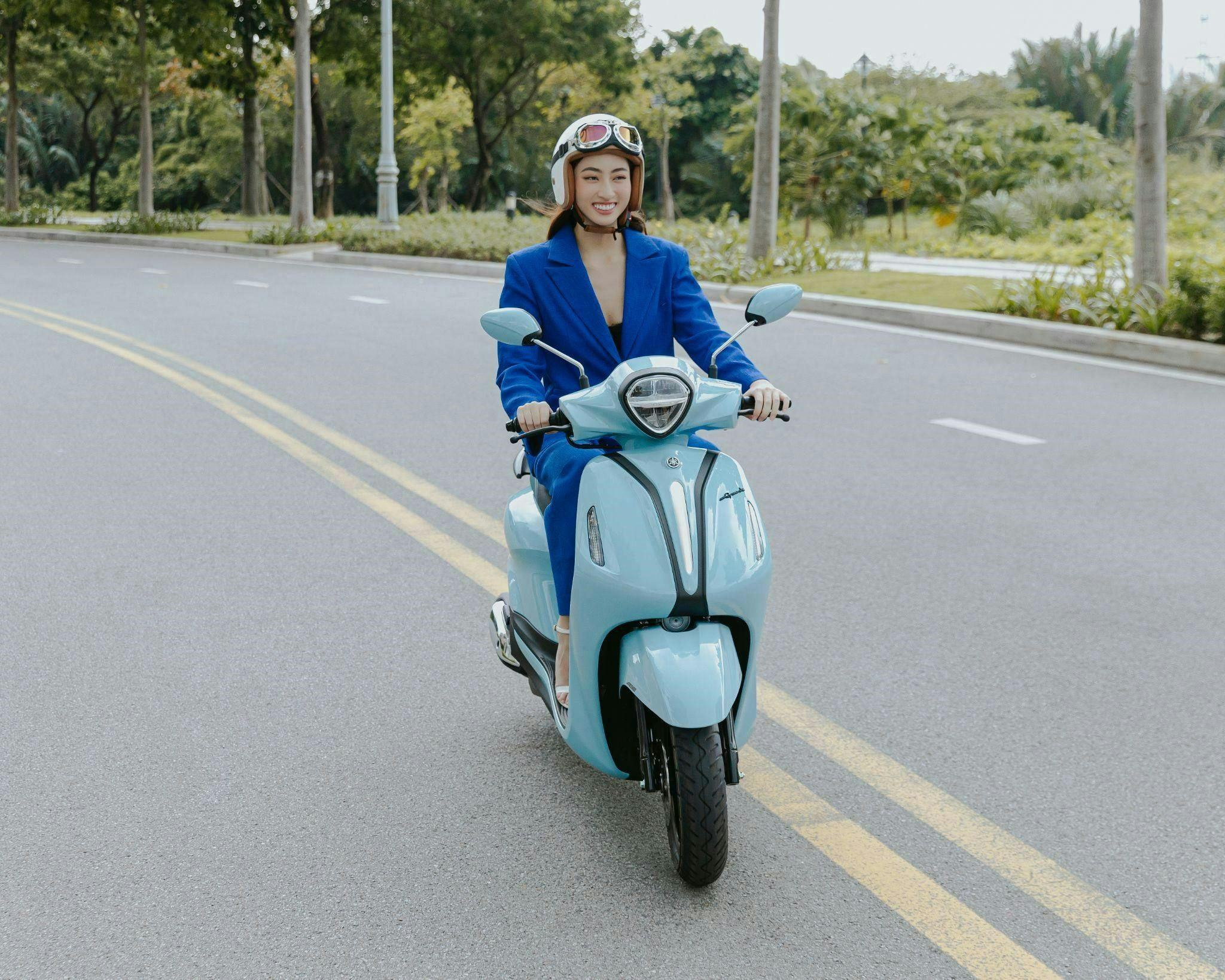 adult female person woman scooter transportation vehicle motorcycle