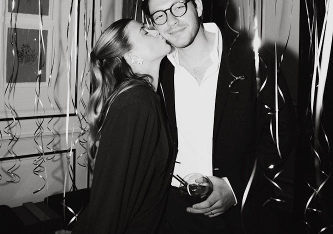 kissing person romantic face photography portrait coat glasses jacket suit