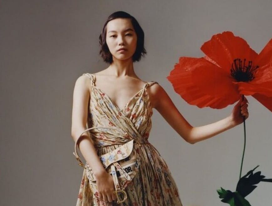 clothing apparel person human dress female flower blossom plant