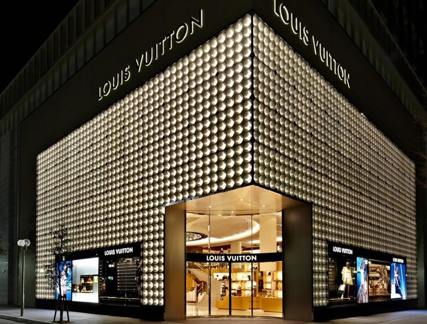shop office building building city town urban shopping mall metropolis architecture person