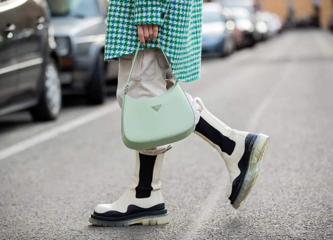 clothing car transportation person wheel footwear accessories handbag bag shoe