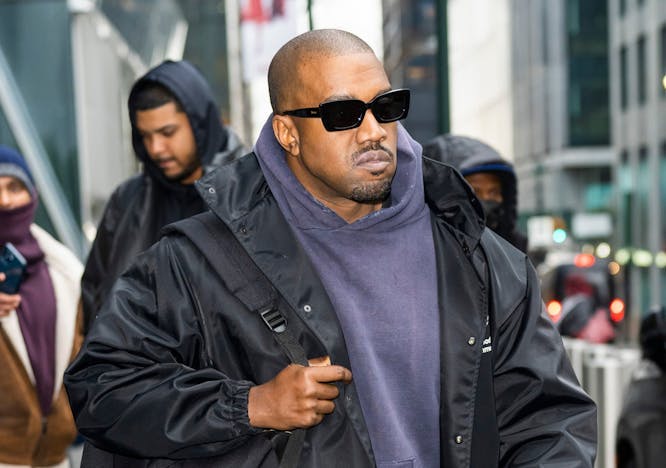 clothing apparel person human sunglasses accessories pedestrian coat jacket overcoat