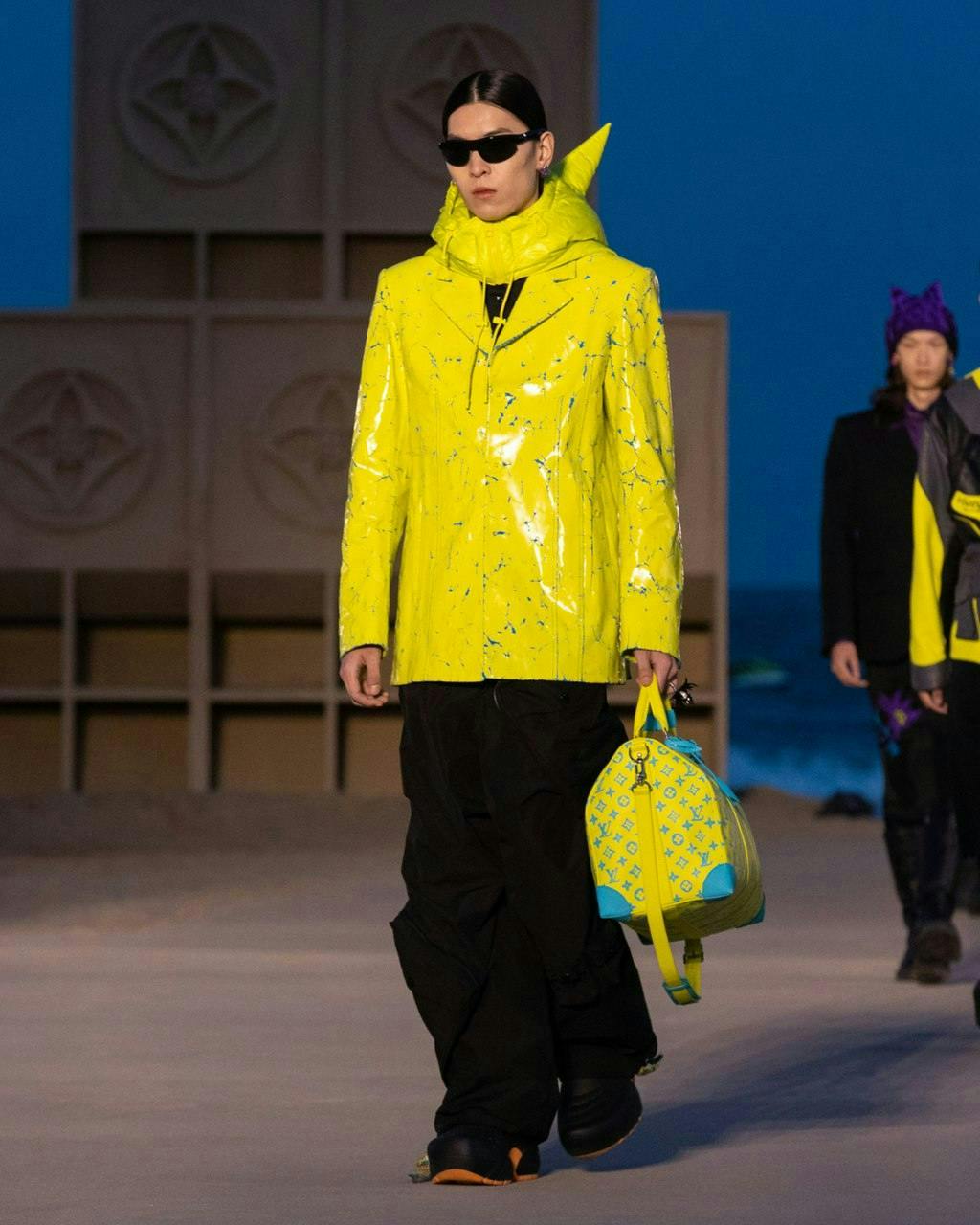 clothing apparel coat person human sunglasses accessories accessory raincoat