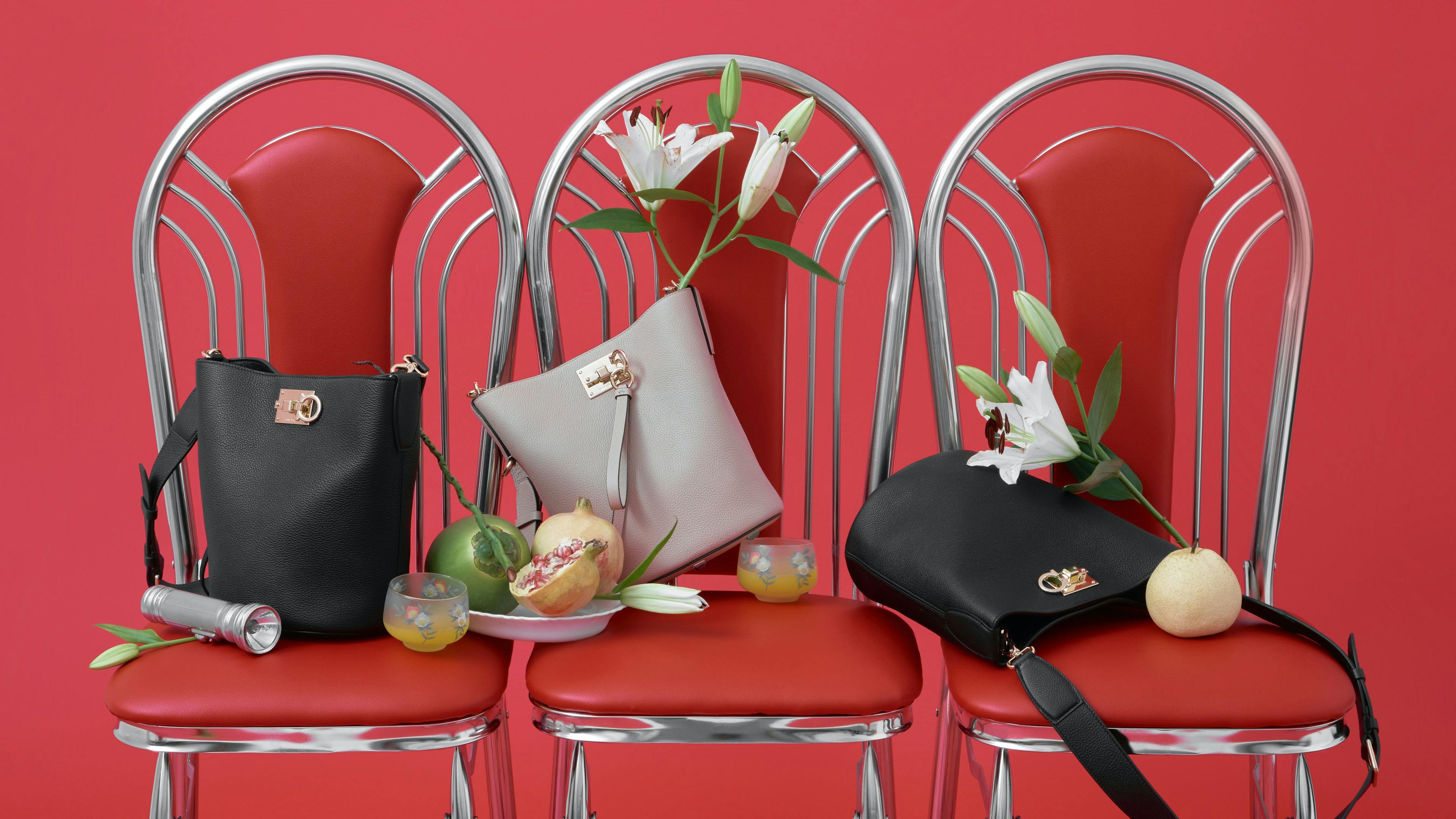 handbag bag accessories purse flower arrangement flower plant chair furniture