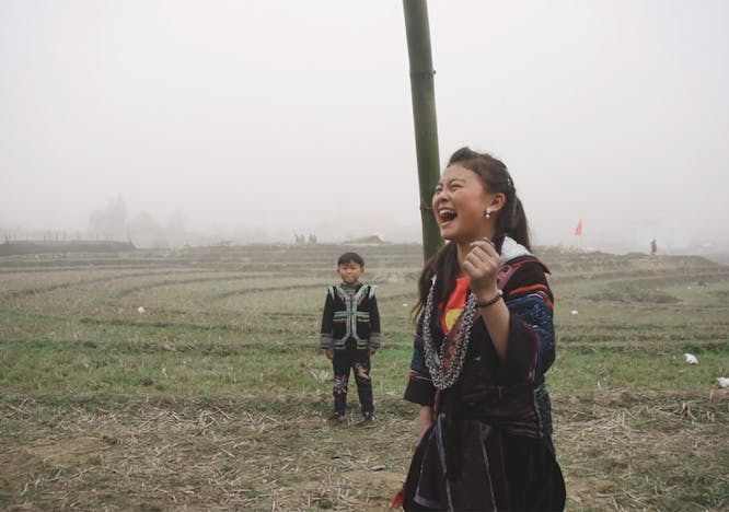 face head person happy grass laughing outdoors nature field portrait