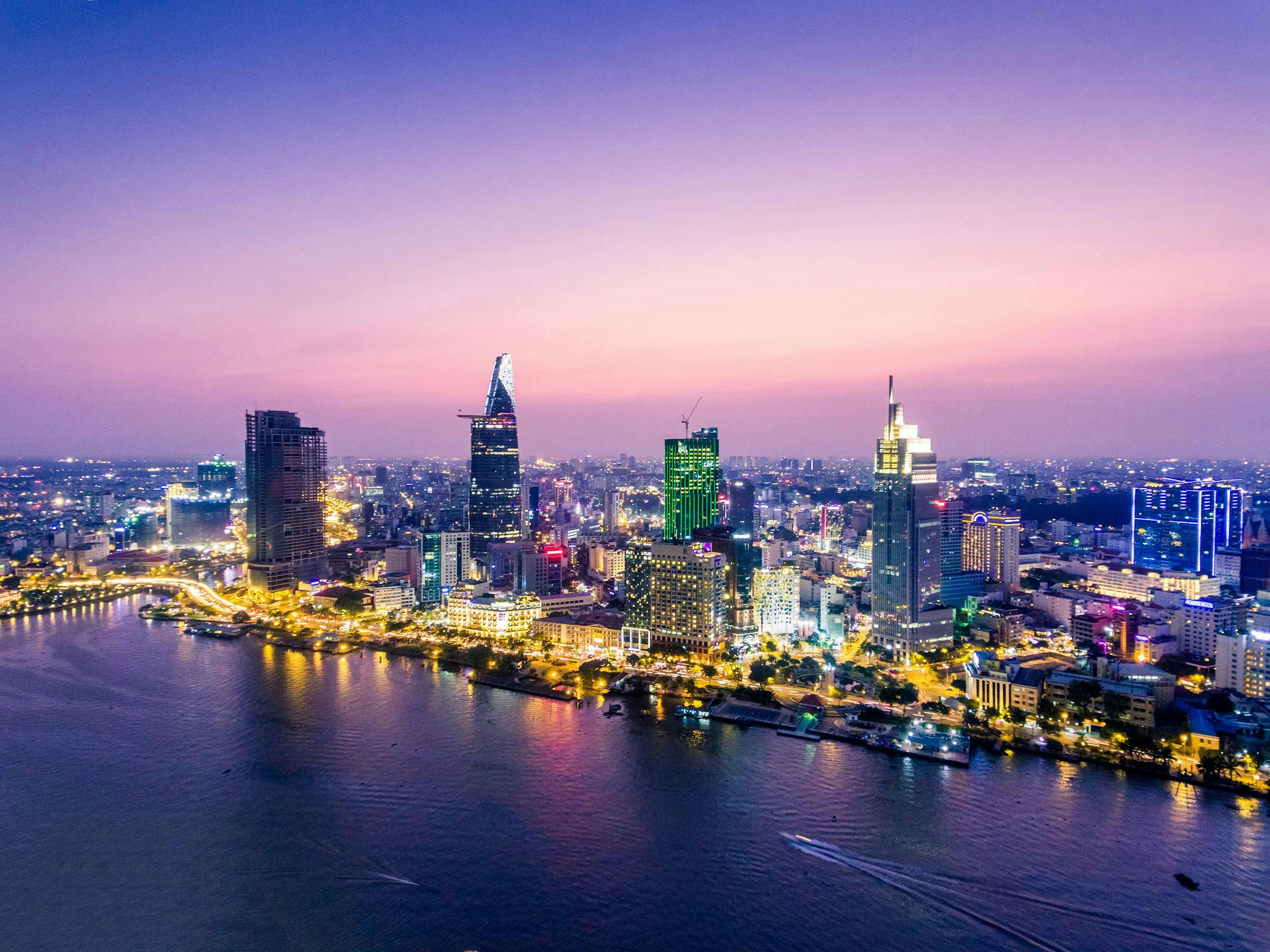 symbol,city,exterior,ho,panoramic,ben,skyline,bitexco,quach,building,saigon,speed,view,modern,car,road,street,landmark,day,park,architecture,tower,traffic,famous,business,orient,chi,metropolis,minh,old,asia,night,asian,indochina,vietcombank,vietnam,downtown,vietnamese,outdoor,fast,urban,light,culture,river,evening,travel,colorful,unseen architecture building cityscape urban city metropolis water waterfront outdoors