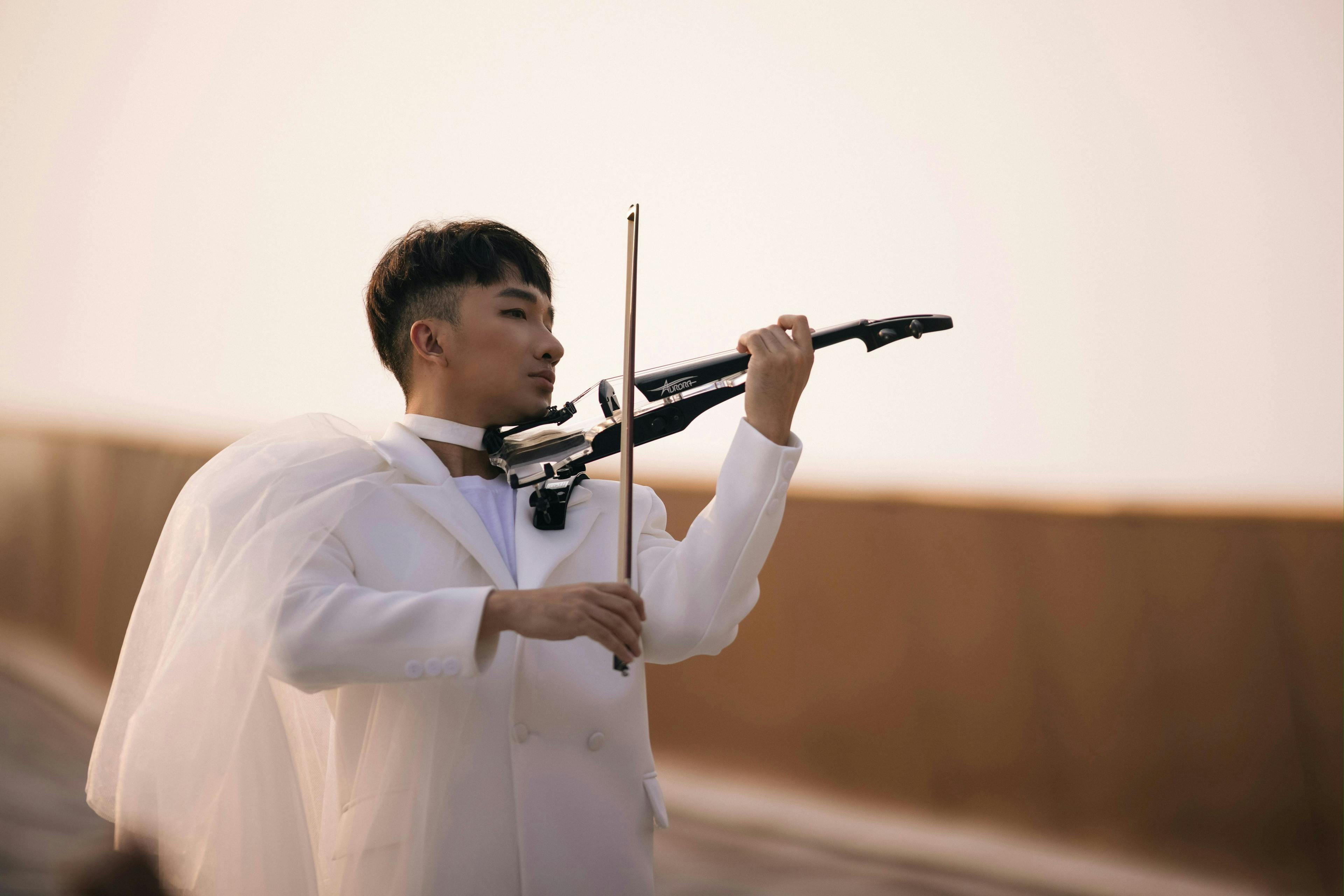 adult male man person performer music musical instrument musician solo performance gun