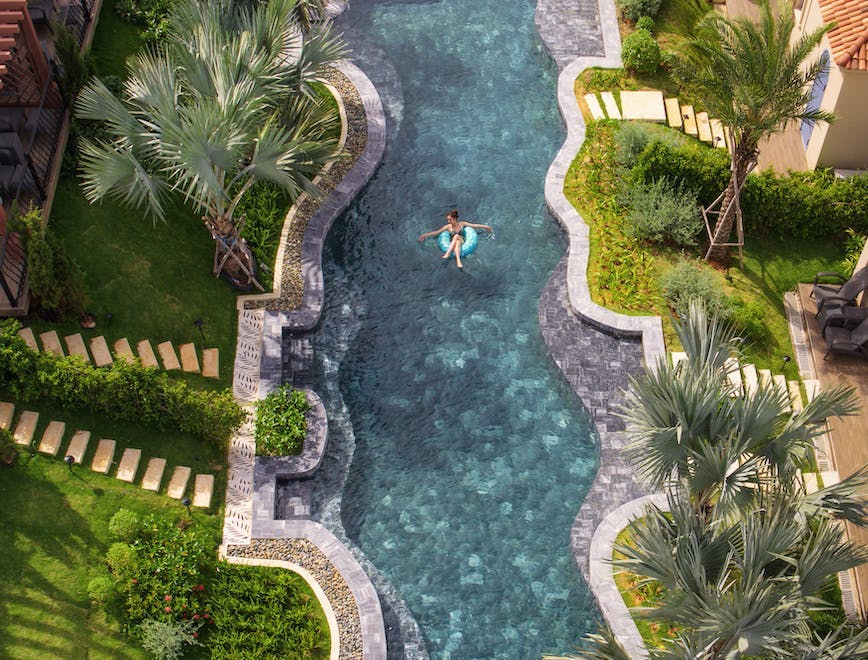 pool water swimming pool outdoors hotel resort person garden summer backyard