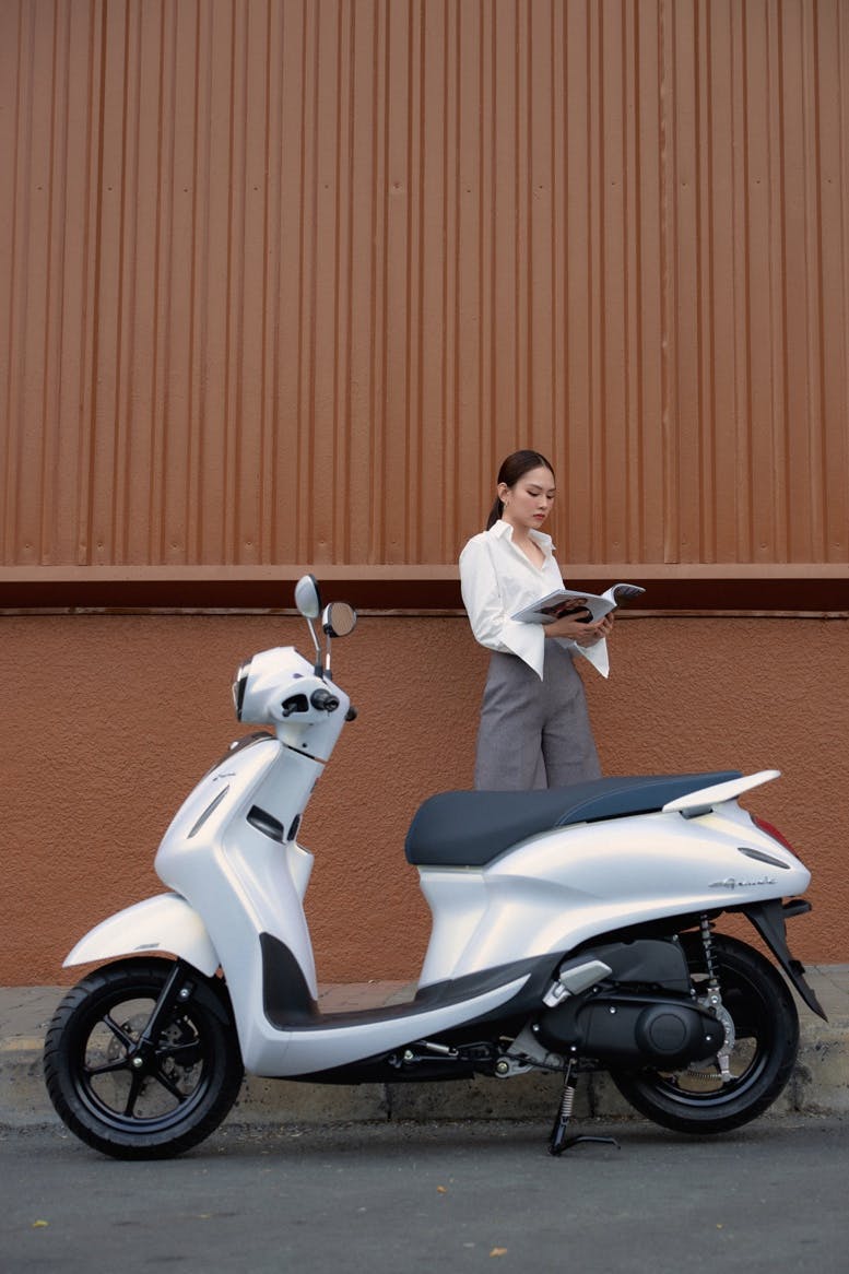 machine wheel motor scooter motorcycle vehicle scooter adult female person woman
