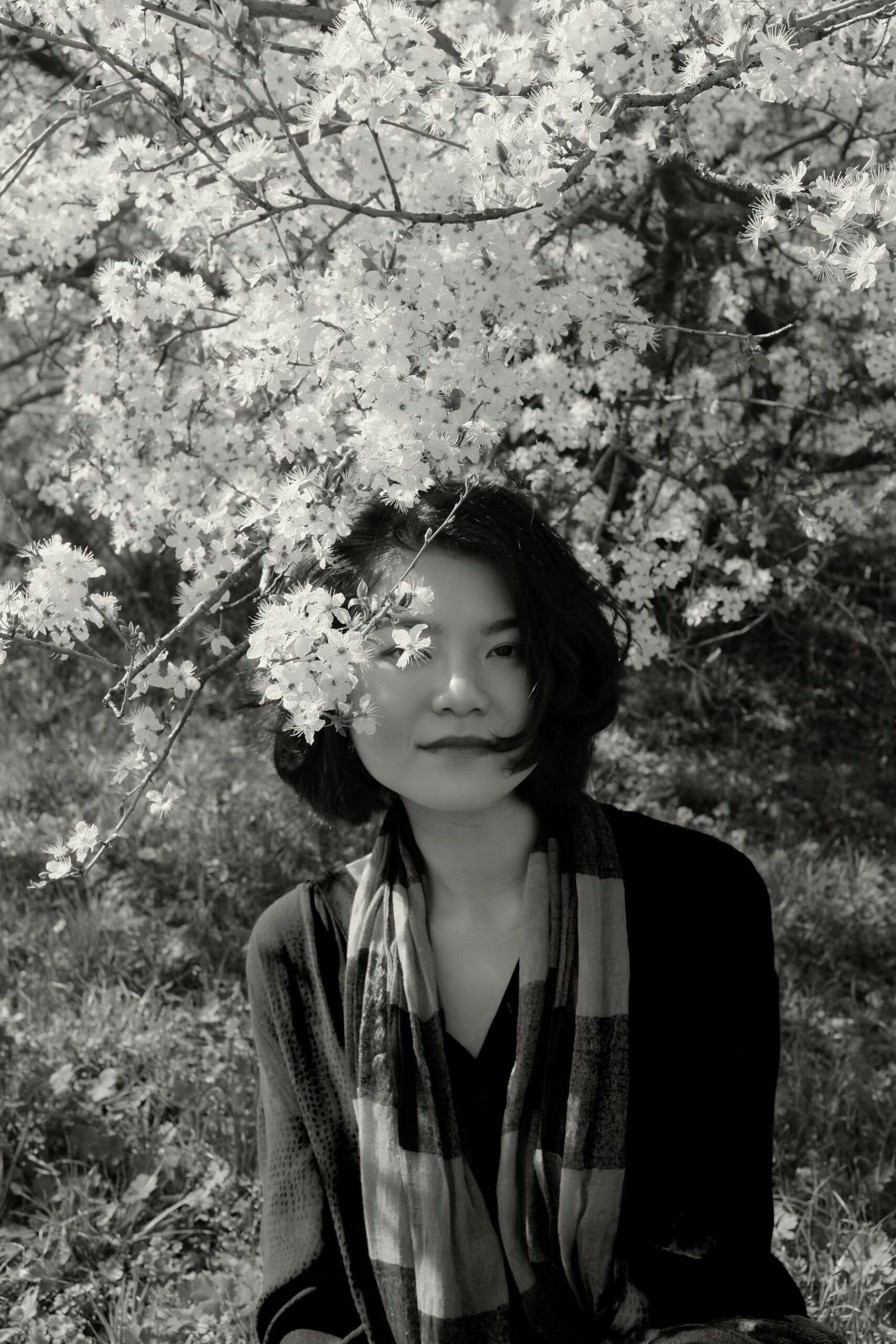 person photography portrait vegetation tree smile adult female woman flower