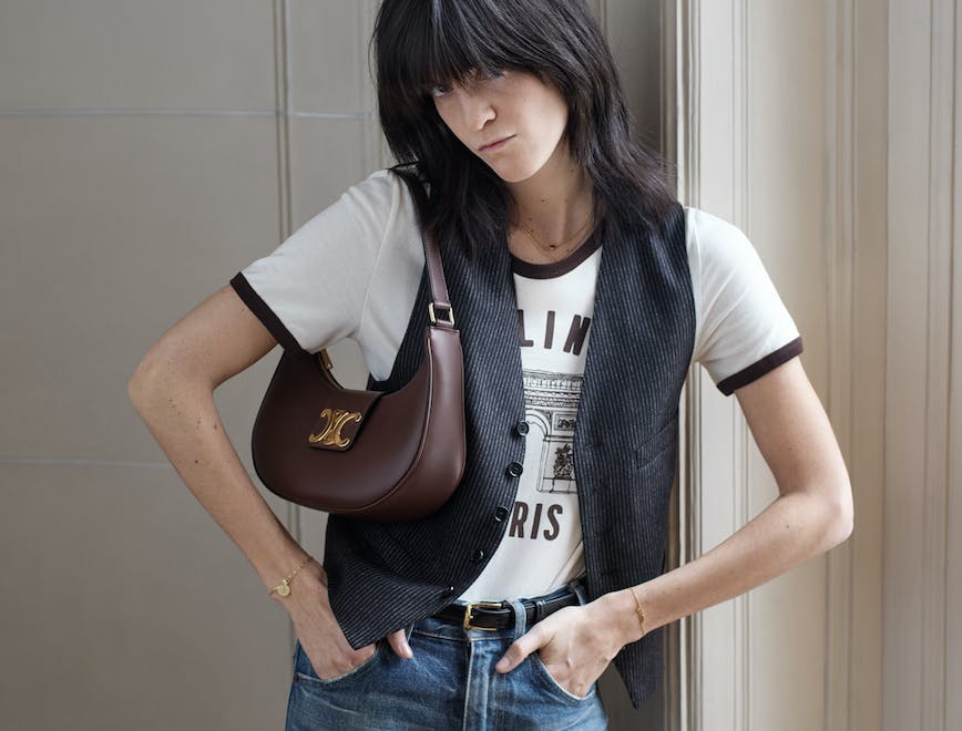 clothing vest pants accessories handbag female girl person teen jeans