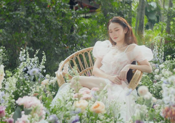 person sitting garden nature outdoors herbal dress wedding gown vegetation flower