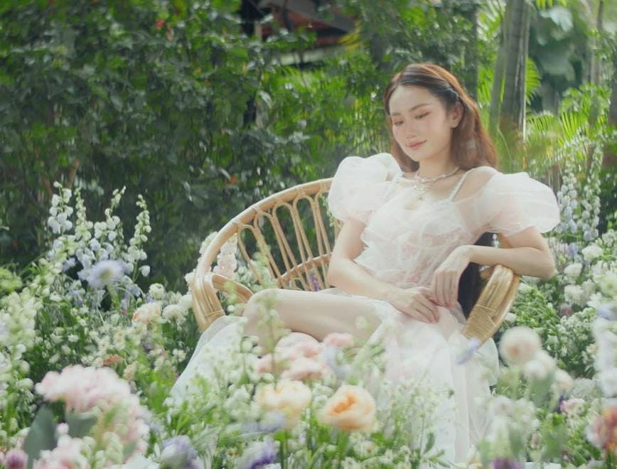 person sitting garden nature outdoors herbal dress wedding gown vegetation flower
