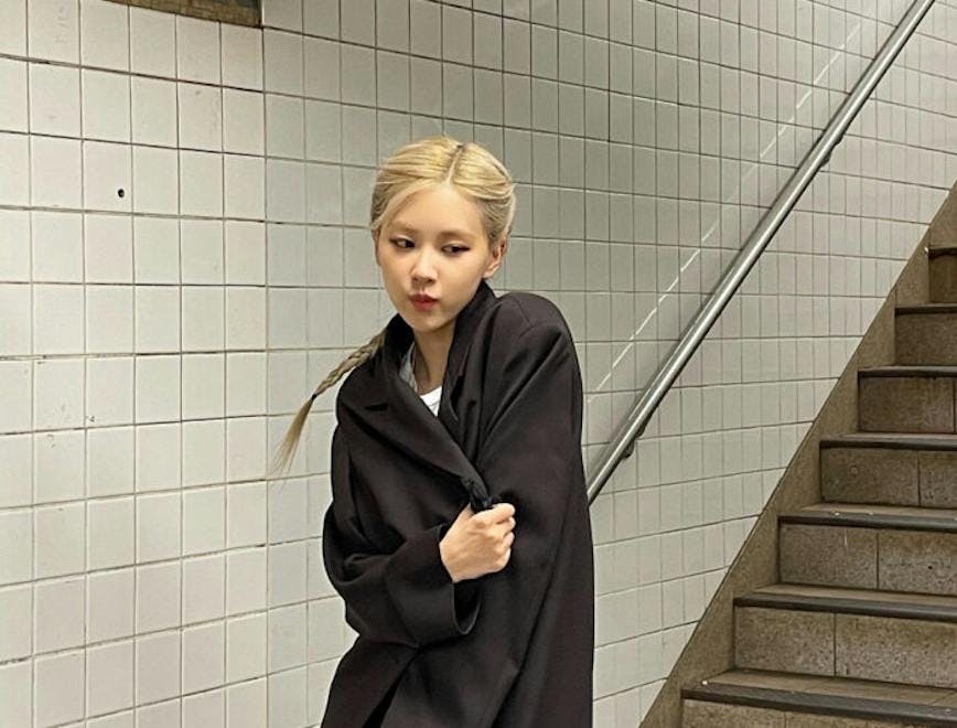 clothing coat person student blonde hair building house housing staircase
