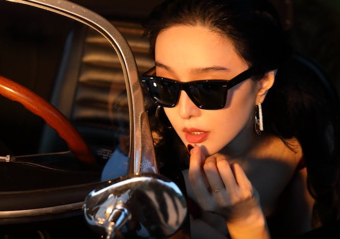 finger hand person accessories sunglasses adult female woman face alloy wheel