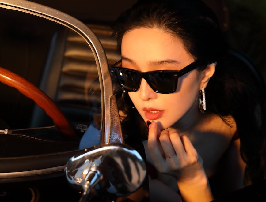 finger hand person accessories sunglasses adult female woman face alloy wheel