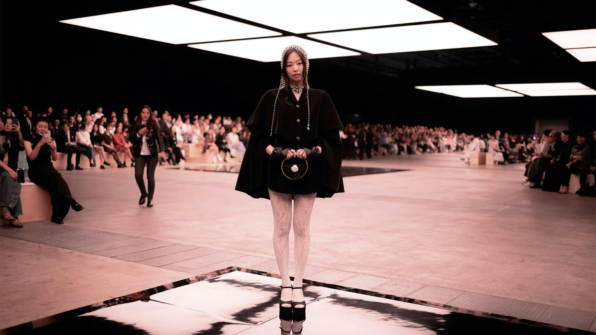 fashion stage person clothing footwear shoe people coat face crowd