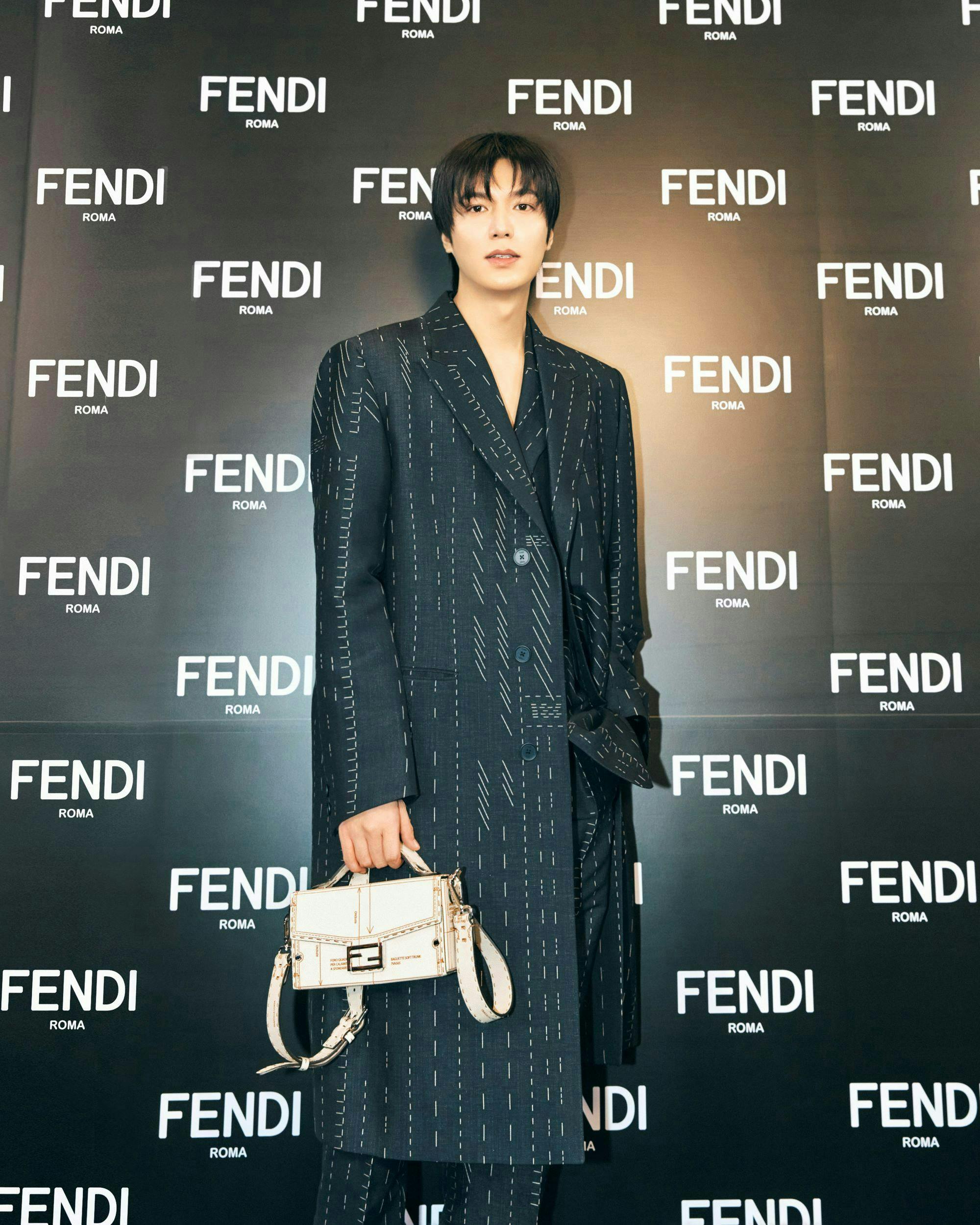 accessories bag handbag coat formal wear suit standing purse fashion black hair