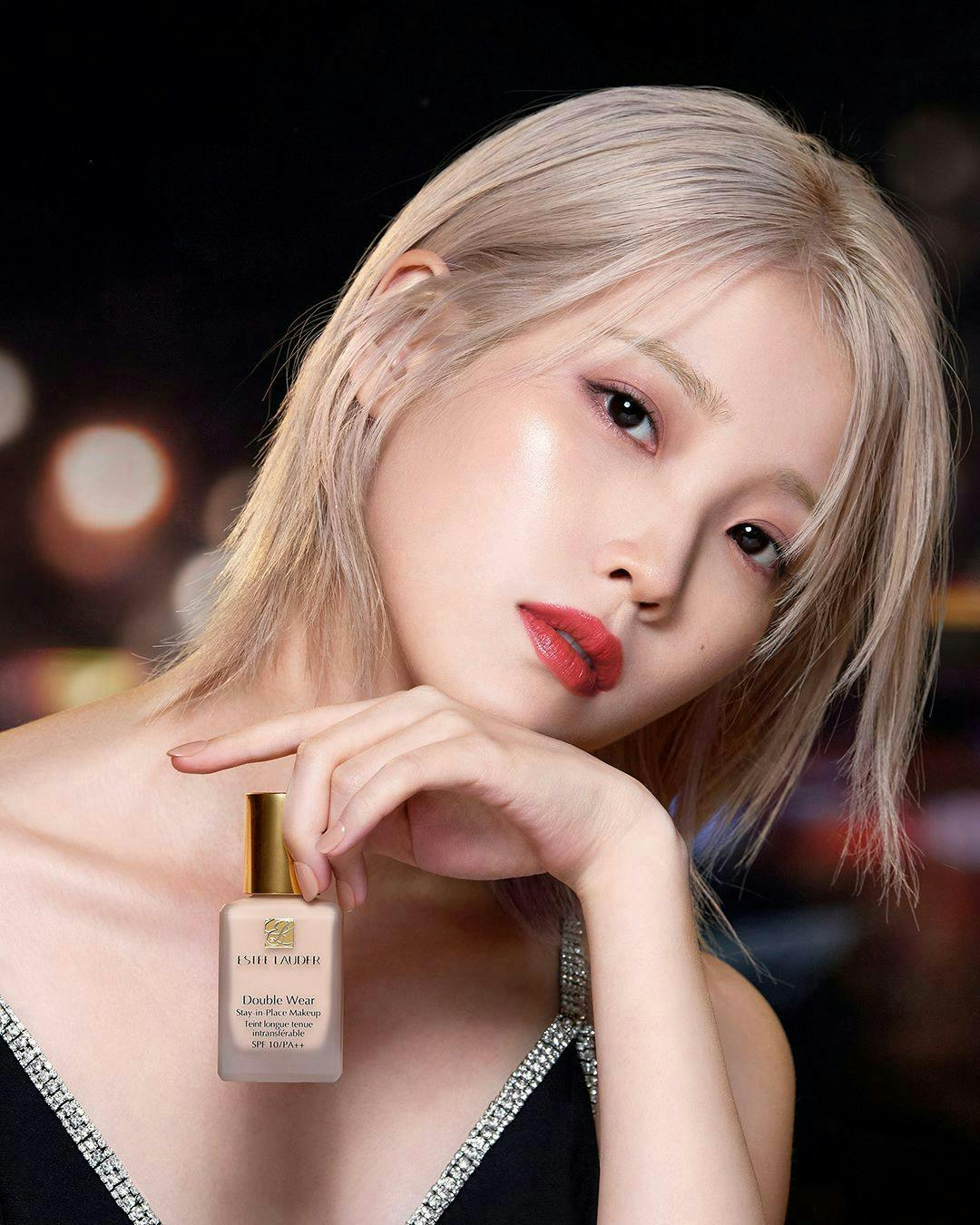 bottle cosmetics perfume blonde hair person