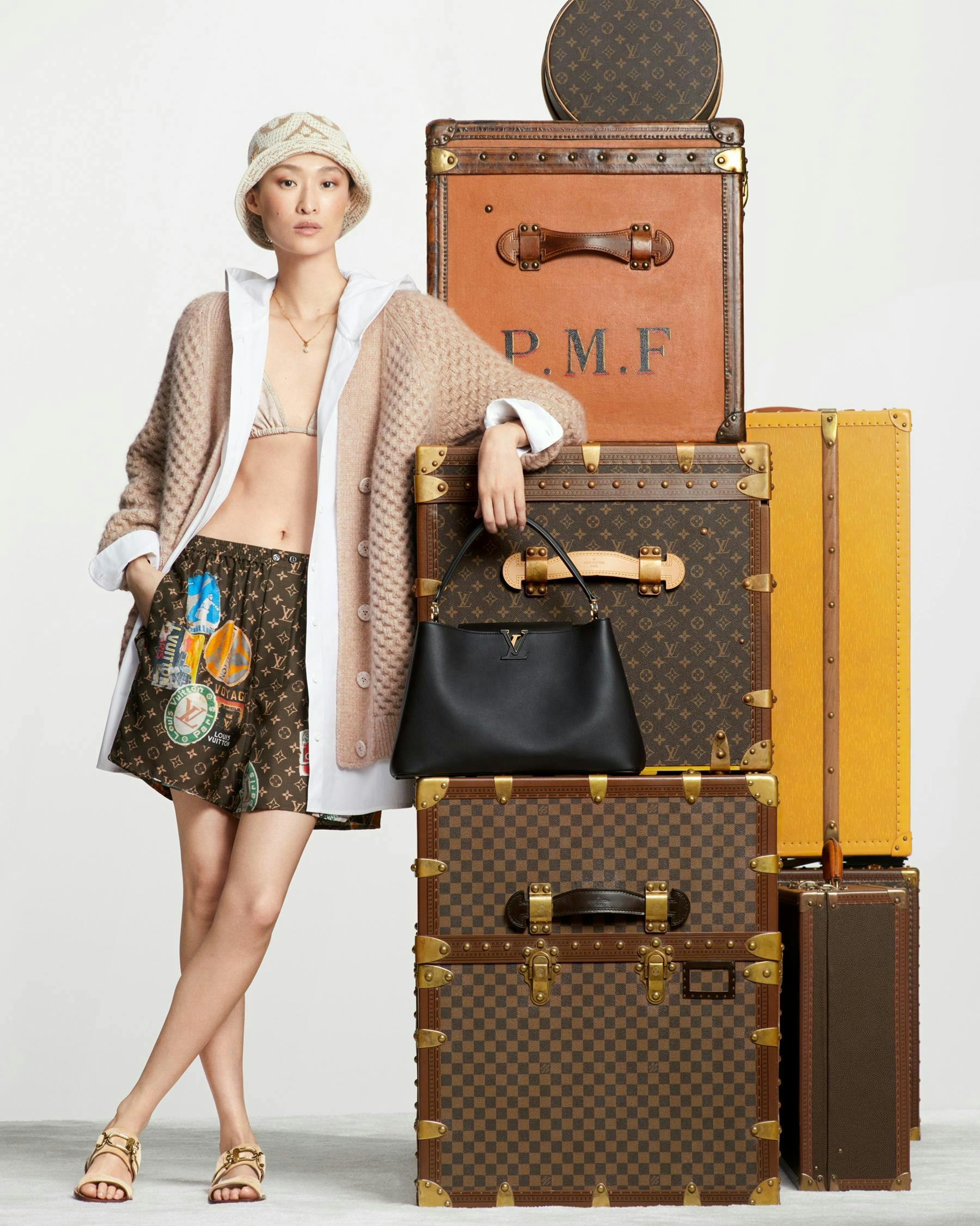 adult female person woman baggage bag handbag clothing coat necklace